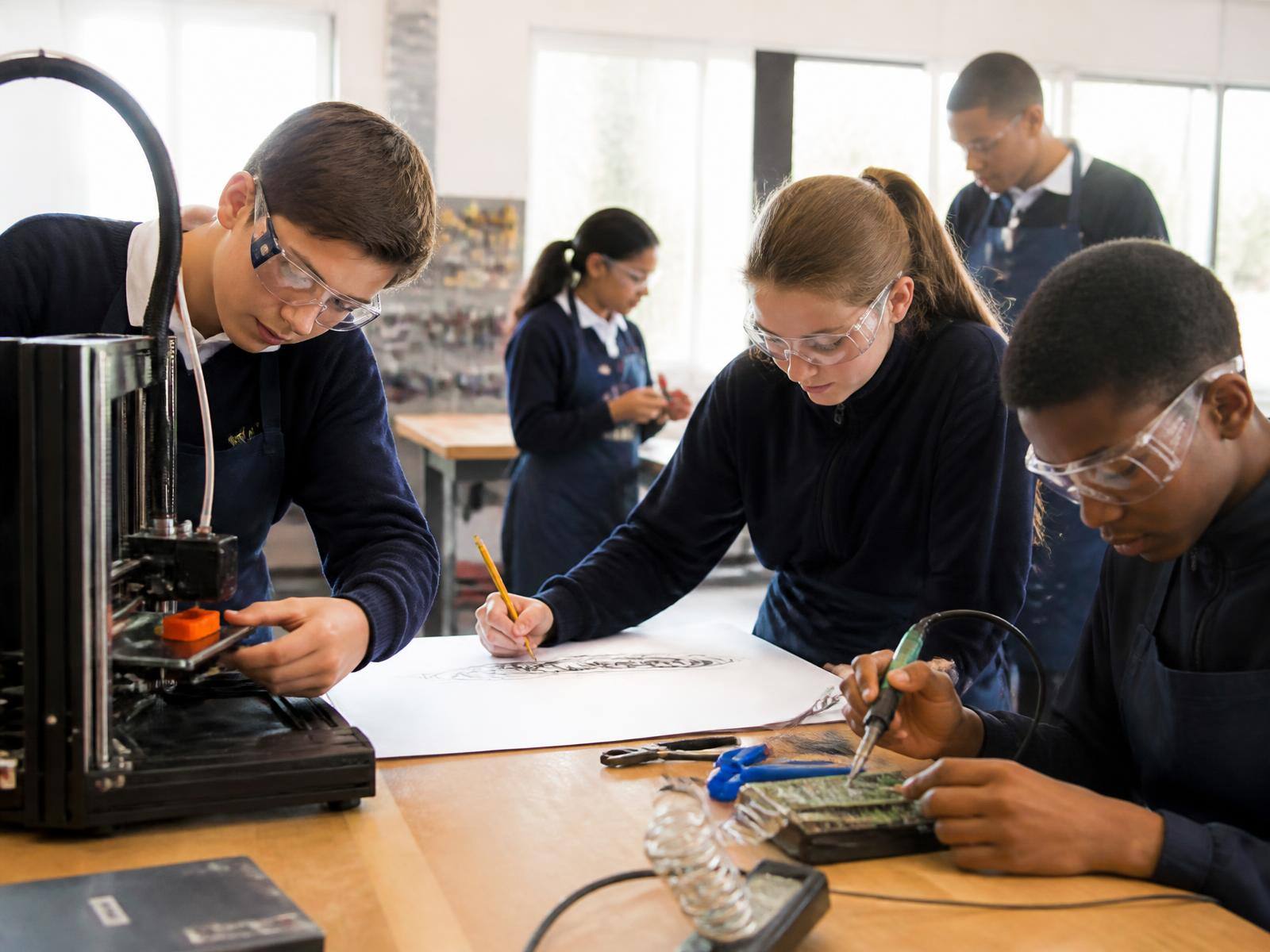 School children prototyping, designing and building in a maker workshop