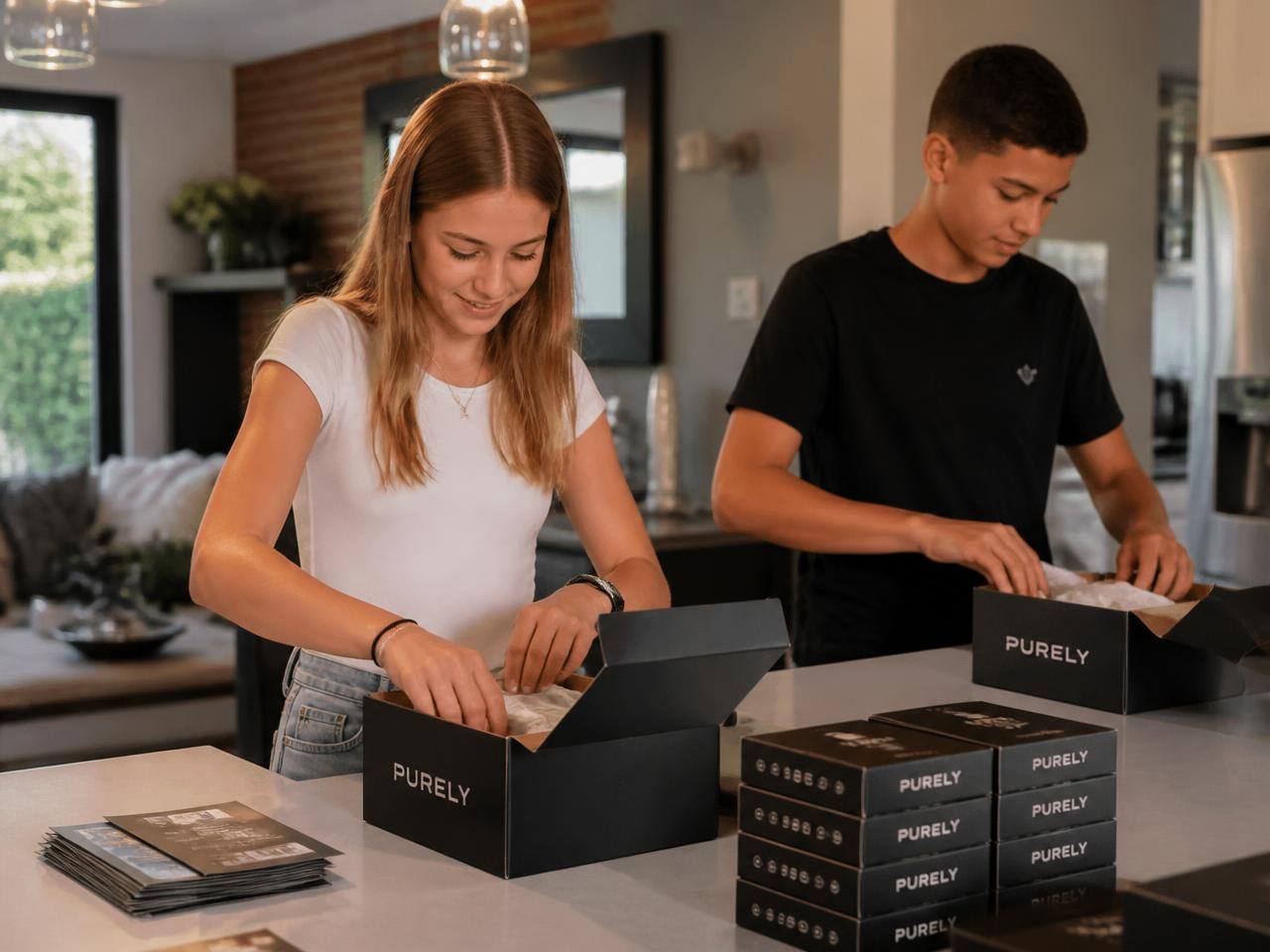 A team of teenagers packing orders together